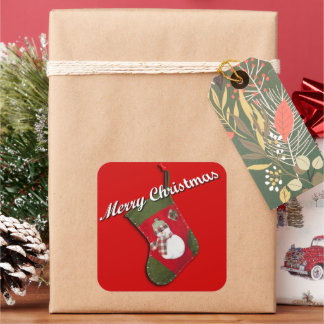 Snowman on Christmas Stocking Over Red Square Sticker