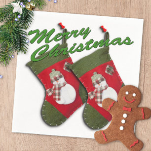 Snowman on Christmas Stocking Over White Napkins