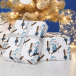 Snowman Skiing In White Wrapping Paper<br><div class="desc">Cute snowman with blue stocking cap skiing on a white background.
Background color can be changed.</div>