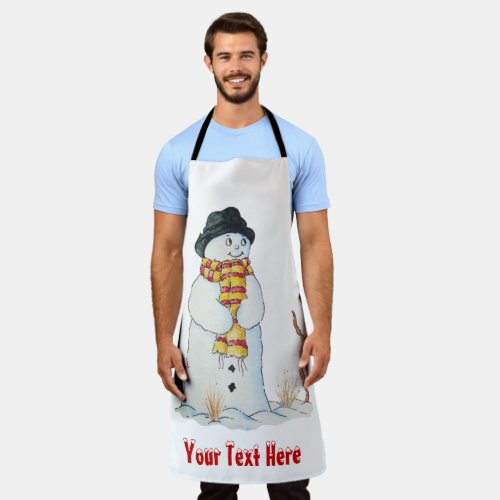 snowman smiling in the snow for fun christmas apron