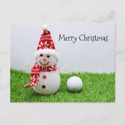 Snowman with golf ball on green grass Christmas Postcard