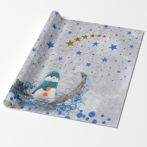 Snowman with sparkly blue stars wrapping paper