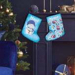 Snowman's Cocoa Delight Christmas Large Christmas Stocking<br><div class="desc">Elevate your holiday decor with our delightful "Cocoa's Delight" Christmas Stocking, a heartwarming addition to your festive ambiance. This stocking features a charming and playful design, capturing the enchantment of the Christmas season. On the front of the stocking, a snowman is savoring a cup of hot cocoa, surrounded by whimsical...</div>