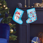 Snowman's Winter Wonderland Christmas Large Christmas Stocking<br><div class="desc">Transform your holiday decor with our enchanting "Snowman's Winter Wonderland" Christmas Stocking. This delightful stocking is a captivating addition to your festive ambiance, boasting a playful design that encapsulates the enchanting spirit of the Christmas season. The front of the stocking features a whimsical snowman, snugly dressed in warm winter gear,...</div>