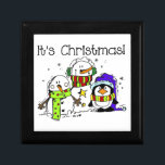 Snowmen and Penguins It's Christmas Keepsake Box<br><div class="desc">A cute holiday design featuring two snowmen and a penguin dressed in scarves,  winter hats,  and earmuffs and text that reads It's Christmas on holiday T-shirts,  sweatshirts,  mugs,  bags,  cards,  stickers,  keepsakes,  pillows,  and much more!</div>