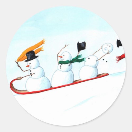 Snowmen on a Sled Classic Round Sticker