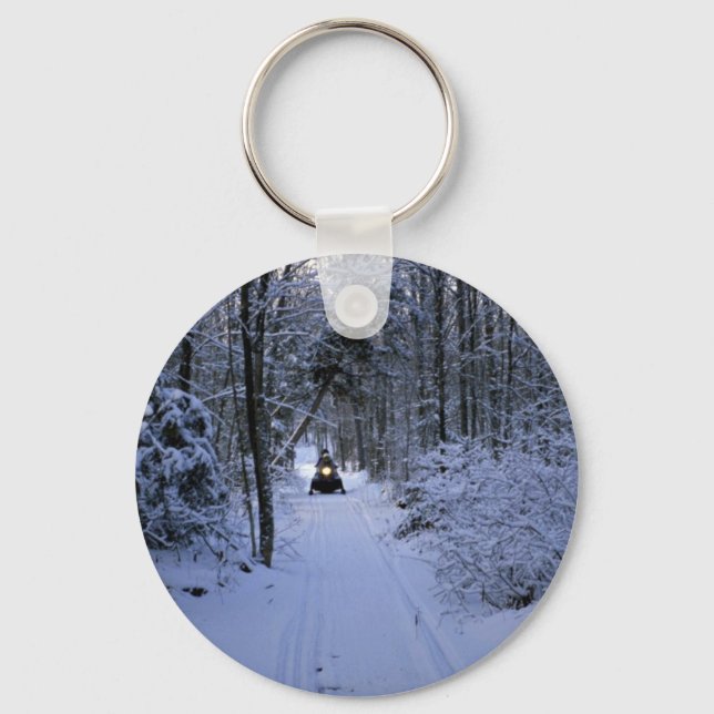 Snowmobiling after fresh snowfall Winter Keychain (Front)