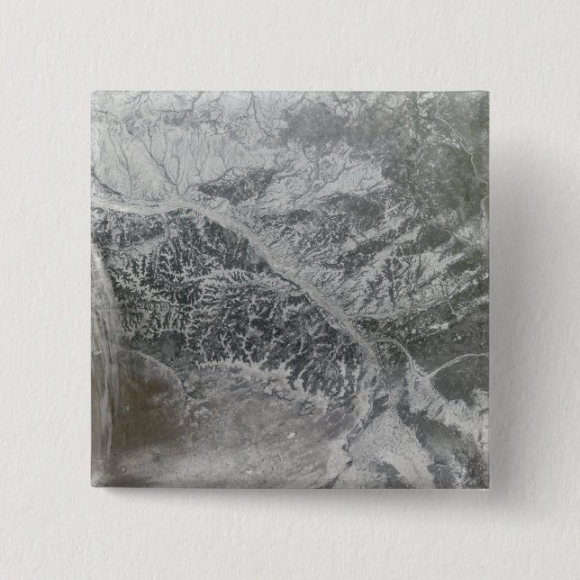 Snowy and hazy central Russia showing the Ob Ri Button (Front)