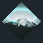 Snowy mountain mysterious blue neon light graduation cap topper<br><div class="desc">Digital composition of my own photograph of magnificent mountain Storžič in Slovenia. I added a neon light surrounding the mountain in Photoshop to create a mysterious scenery.</div>