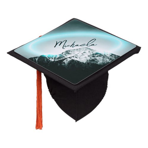 Snowy mountain mysterious blue neon light monogram graduation cap topper