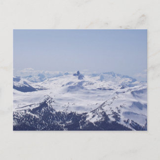 Snowy mountaintop postcard