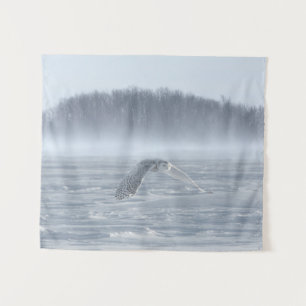 Snowy Owl Flying In Winter Tapestry
