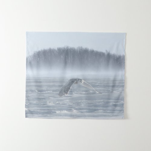 Snowy Owl Flying In Winter Tapestry