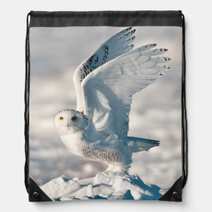 Snowy Owl taking off from snow Drawstring Bag