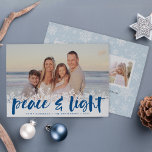 Snowy Peace | Hanukkah Photo Card<br><div class="desc">Modern Hanukkah photo cards feature your favorite image with a white snowflake border along the bottom. "Peace and light" appears in lapis blue hand lettered brush typography,  with your names and the year beneath. Customize the snowflake patterned back with three additional photos and a personal message.</div>