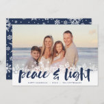 Snowy Peace | Hanukkah Photo Holiday Card<br><div class="desc">Modern Hanukkah photo cards feature your favorite image with a white snowflake border along the bottom. "Peace and light" appears in navy blue hand lettered brush typography,  with your names and the year beneath.</div>