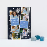 Snowy Photobooth Hanukkah Photo Collage Card<br><div class="desc">Cute Hanukkah photo card features two photo booth strips, each with three photos and a blue text panel, for a total of six photos. Personalize with the year and your family name or names in whimsical, festive white lettering, on a navy blue background dotted with hand drawn white snowflakes and...</div>
