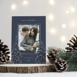 Snowy Pine | Elegant Christmas Photo Holiday Card<br><div class="desc">A modern and elegant Christmas holiday card design featuring a single vertical photo on a navy blue background. Two tall pine trees frame your photo,  dotted with white snow. Personalize with your custom holiday greeting,  family name and the year.</div>
