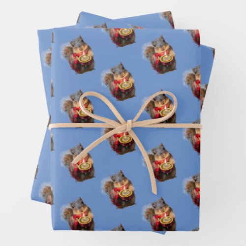 Snowy Squirrel Holding Candle Wrapping Paper Sheets