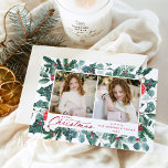 Snowy Winter Botanical Merry Christmas 2 Photo Holiday Card<br><div class="desc">Send warm holiday greetings to family and friends with an elegant holiday photo card by Late Bloom Paperie! The festive card features two of your favorite photos framed by painted red flowers, cotton blooms, holly berries, eucalyptus leaves, and pine boughs. "Merry Christmas" is displayed in a dark red calligraphy script...</div>