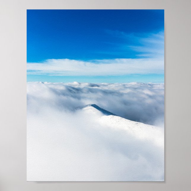 Snowy winter mountain wrapped in clouds poster (Front)