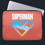 Soaring Through the S-Shield Laptop Sleeve<br><div class="desc">Unleash the heroic energy of the Man of Steel with this bold and inspiring design! A silhouette of Superman rockets skyward, leaving a brilliant trail through a vibrant sky, all framed within his iconic “S” emblem. The deep red backdrop contrasts beautifully with the sky blue and golden hues peeking through...</div>