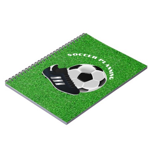 Soccer Ball and Cleats on Field Notebook