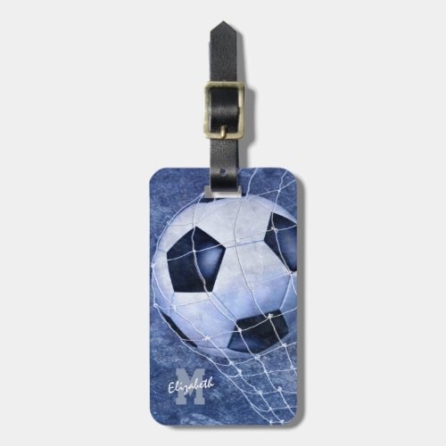 Soccer ball denting the net blue girls soccer luggage tag