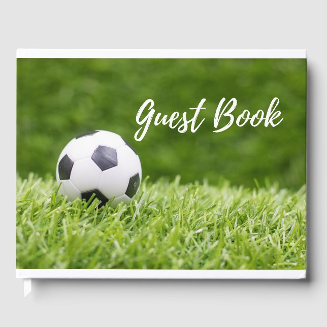 Soccer ball on green grass  guest book (Front)