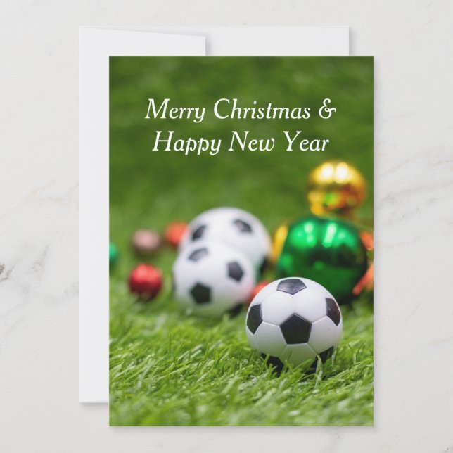 Soccer ball with Christmas decoration on green   Holiday Card (Front)