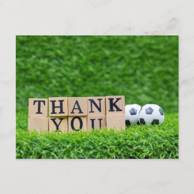 Soccer ball with Thank you word are on green grass Postcard (Front)
