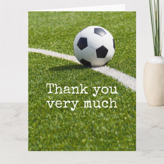 Soccer ball with word Thank you on green grass Card (Front)