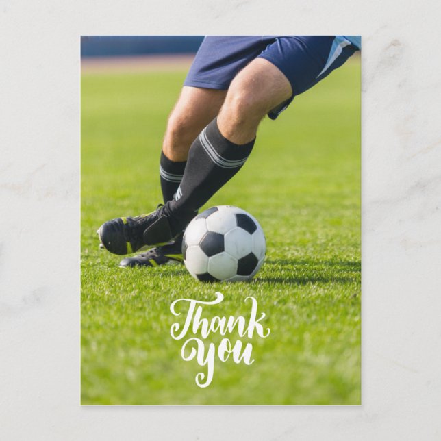 Soccer ball with word Thank you on green grass Postcard (Front)