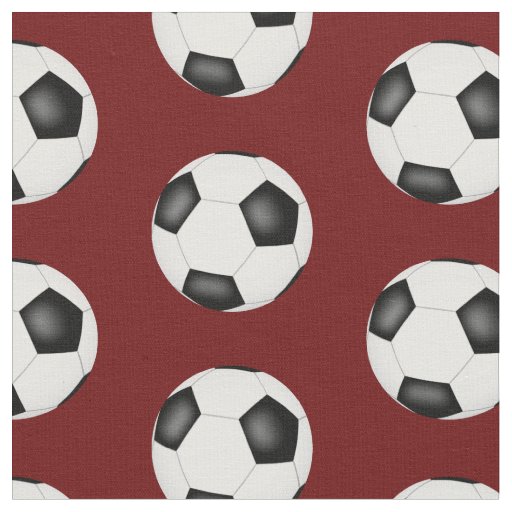 soccer balls on dark red sports pattern fabric