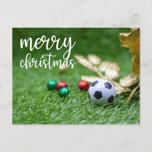 Soccer Christmas Holiday with ball on green grass Postcard
