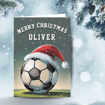 Soccer Football Ball Santa Hat Merry Christmas  Holiday Card<br><div class="desc">Soccer Football Ball Santa Hat Name Merry Christmas Card. The design has a soccer ball with a red Santa hat. Personalize with your name. You can change the text Merry Christmas.</div>