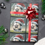 Soccer Football Ball Santa Hat Name Christmas  Wrapping Paper<br><div class="desc">Soccer Football Ball Santa Hat Name Christmas Wrapping Paper. The design has a soccer ball with a red Santa hat. Personalize with your name. You can change the text Merry Christmas.</div>