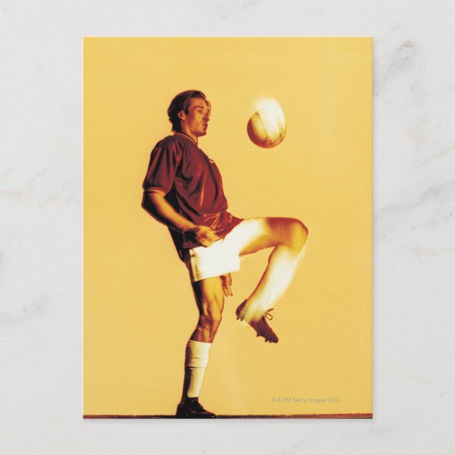 soccer player bouncing ball off knee postcard (Front)
