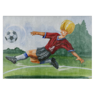 Soccer Player Kicking a Ball by Jay Throckmorton Cutting Board