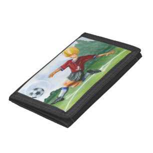 Soccer Player Kicking a Ball by Jay Throckmorton Tri-fold Wallet