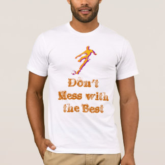 Soccer player kicking ball with saying on t-shirt