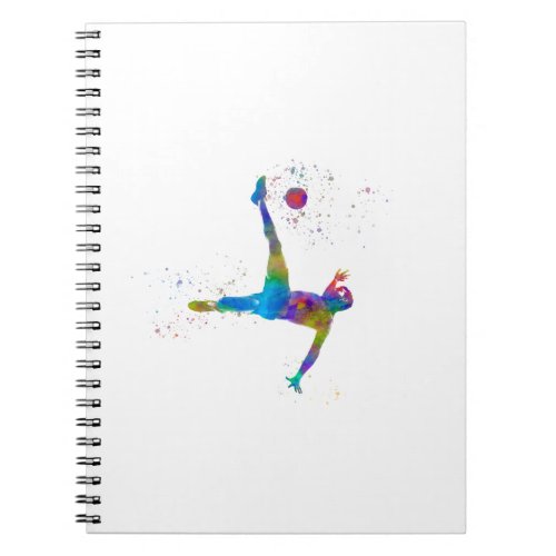 soccer player kicking in watercolor notebook