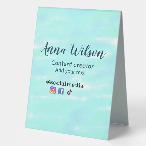 Social media content creator blue green add name t table tent sign