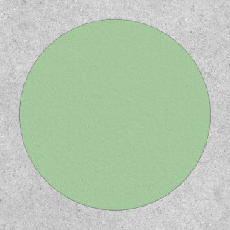 Soft mint-green background fills the image patch