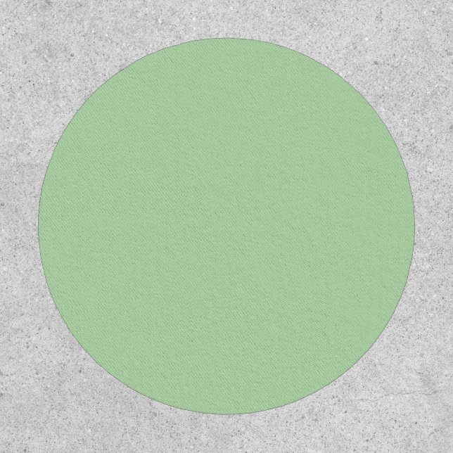 Soft mint-green background fills the image patch (Front)