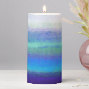 Soft shades of blue and green pillar candle