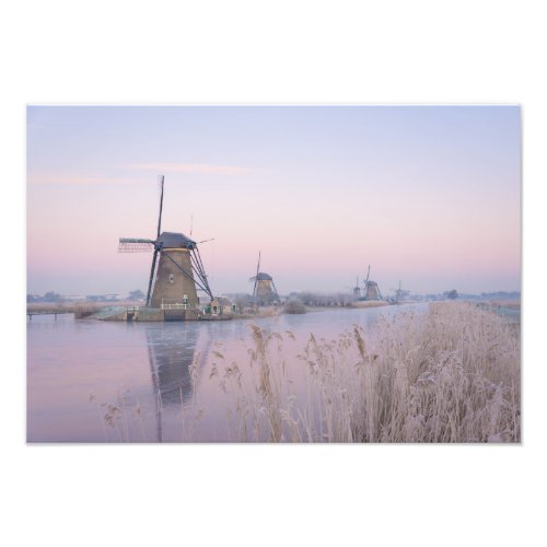 Soft sunrise light in winter over windmills photo print