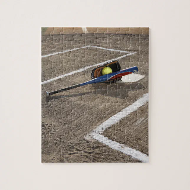 Softball, softball glove and bat at home plate jigsaw puzzle Zazzle