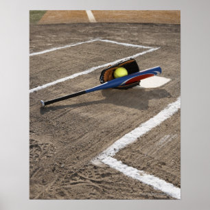 Softball, softball glove and bat at home plate poster