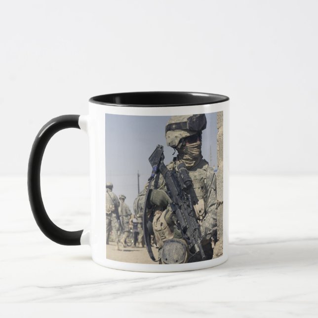 Soldier armed with a MK-48 Mug (Left)